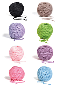 Set of 8 little balls of yarn in assorted colours