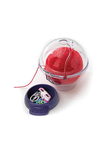 Yarn holder with storage for accessories